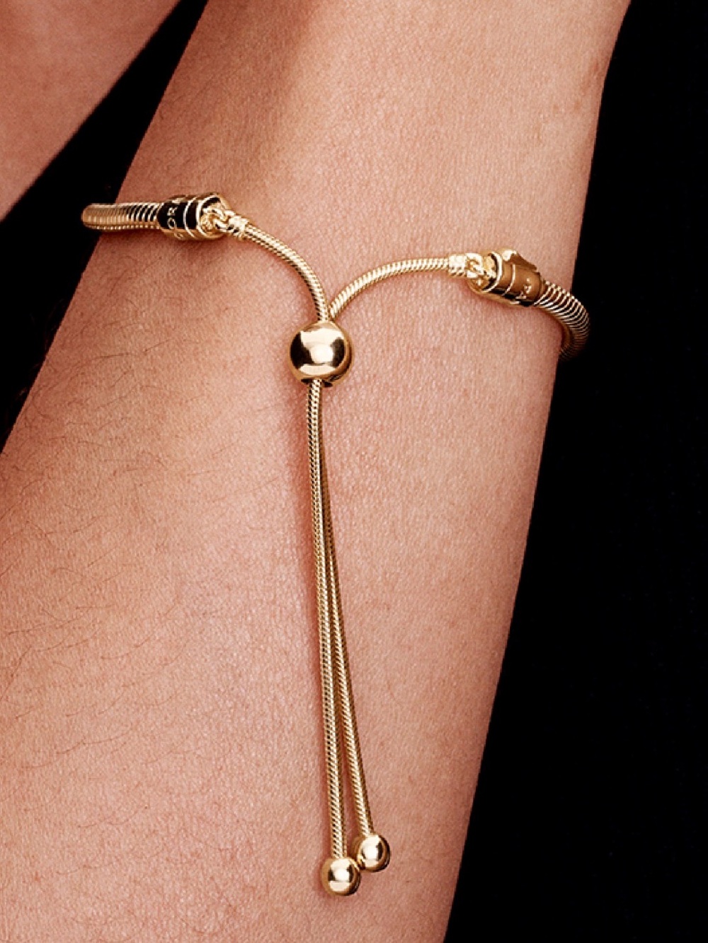 Pandora Gold Heart Slider Bracelet with 14K gold plating with sliding clasp.